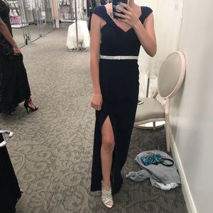 David’s bridal dress , belt and shoes .